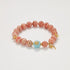 Rhodochrosite & Blue Gem Prosperity Bracelet | Love & Energy